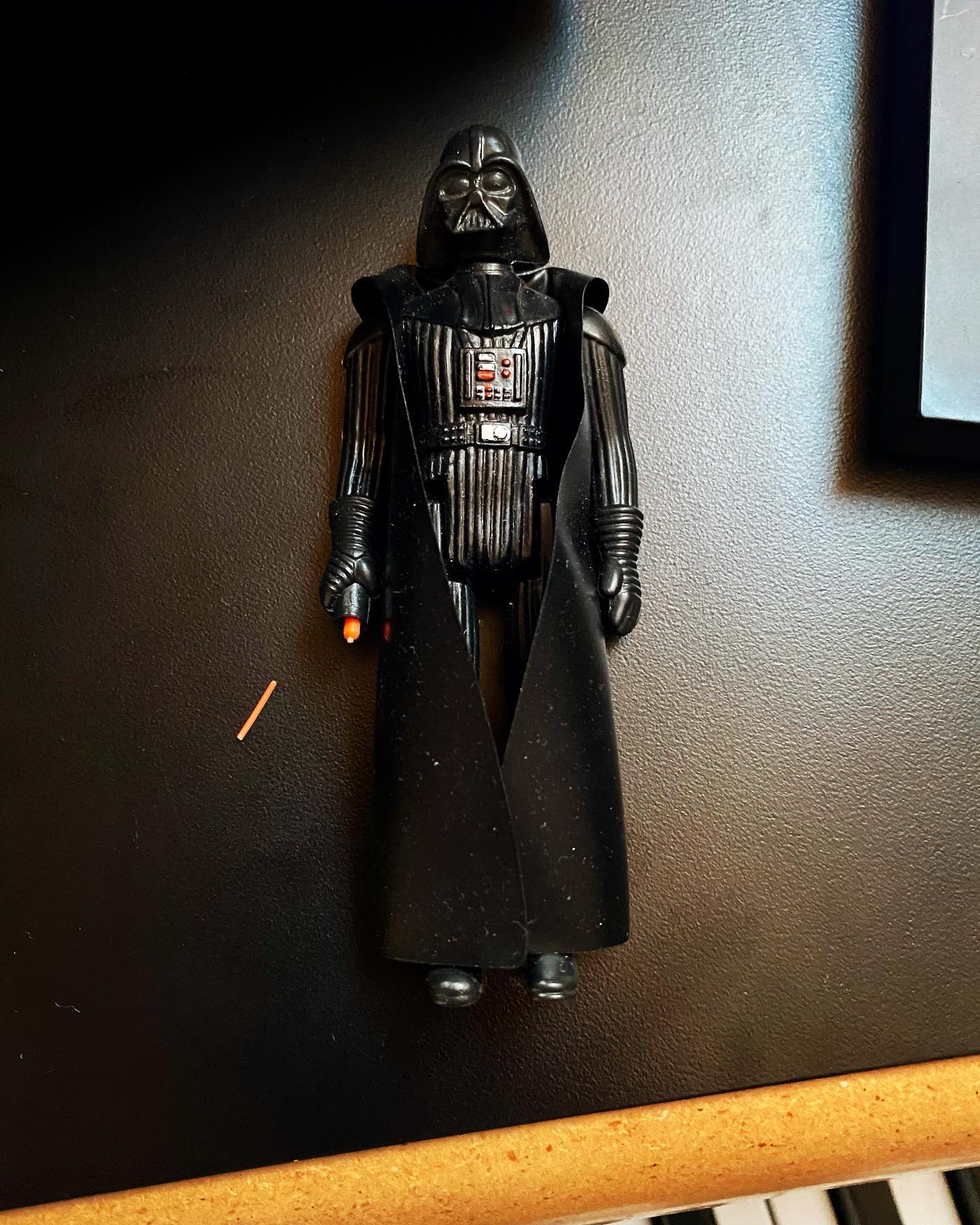 I have a mint Darth Vader action figure on my desk. Correction. I used to have a mint Darth Vader action figure on my desk. RIP David Prowse